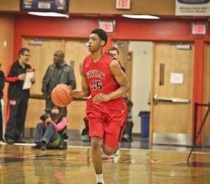Justin Jackson brings the ball up for his high school team Findlay Prep (NV).